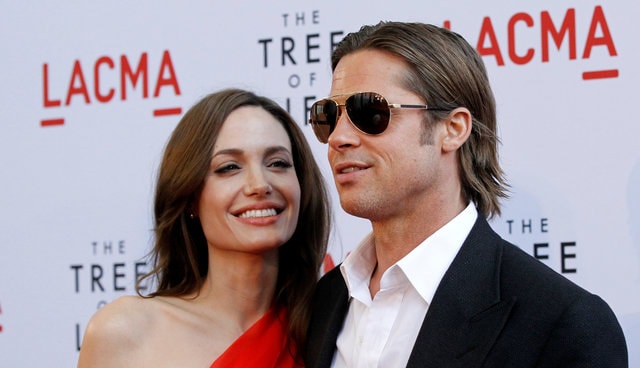 Cast member Brad Pitt and actress Angelina Jolie pose at the premiere of "The Tree of Life" at LACMA in Los Angeles May 24, 2011.  (Photo: Reuters/ File Photo)