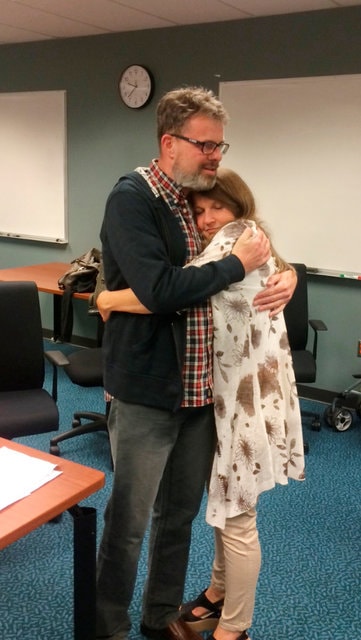Kevin Garratt hugs his wife Julia Garratt after being deported by Chinese authorities, in Vancouver, British Columbia, Canada. (Photo: the Garratt Family/Handout via Reuters)