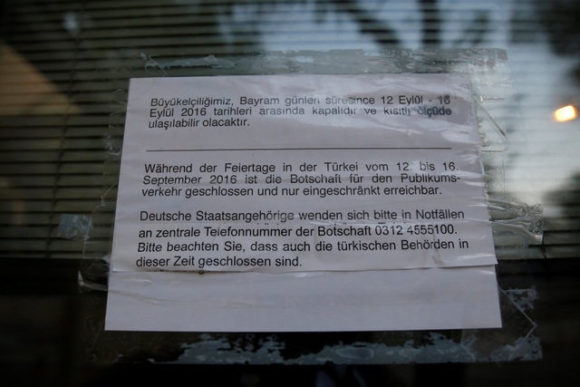 A note at the entrance of the German Embassy is seen in Ankara, Turkey, September 14, 2016. Letters in Turkish reads, "Our Embassy is closed between September 12-September 16 (during the public holiday) and will be limitedly accessible". (Photo: Reuters)