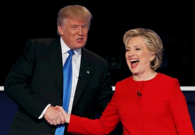 Donald Trump shakes hands with Hillary Clinton at the conclusion of their first presidential debate. (Photo: Reuters)