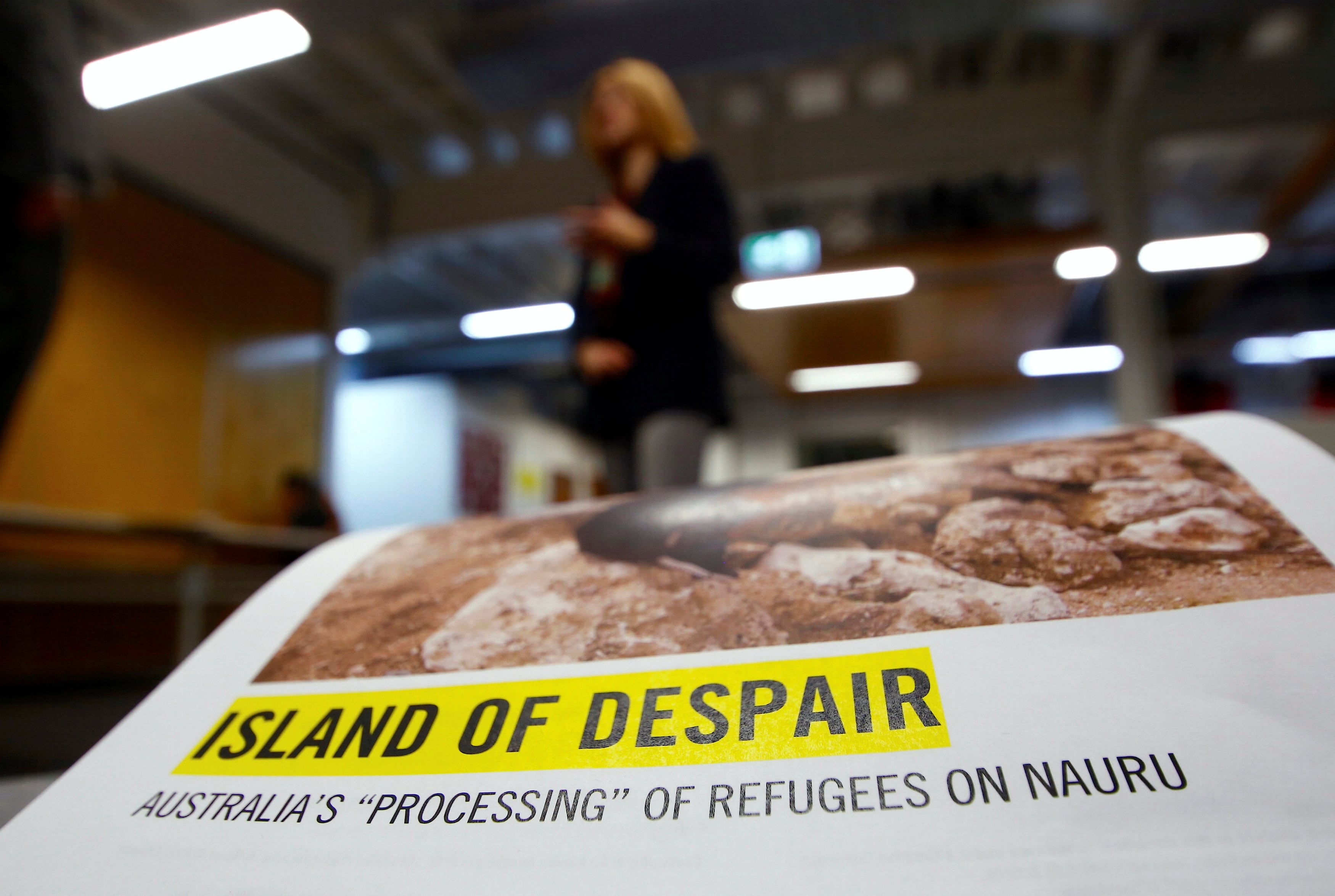 A copy of the report co-authored by Senior Director for Research with Amnesty International, Anna Neistat, titled 'Island of Despair. (Photo: Reuters)