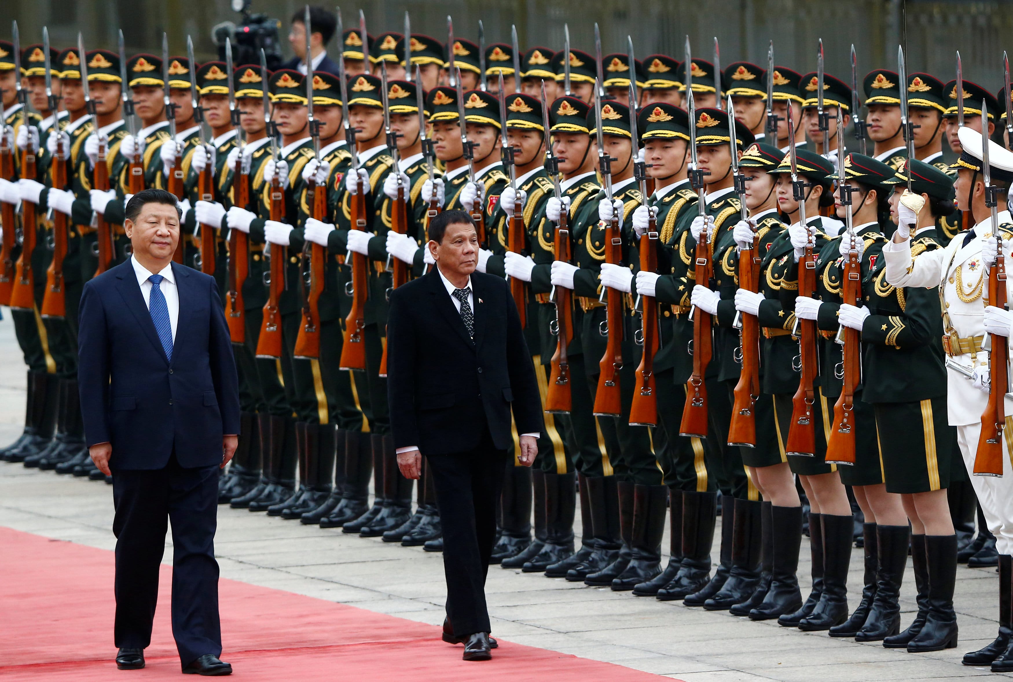 President of the Philippines Rodrigo Duterte and Chinese President Xi Jinping review the guard of honour as they attend a welcoming ceremony at the Great Hall of the People in Beijing, China, October 20, 2016. (Photo: Reuters)