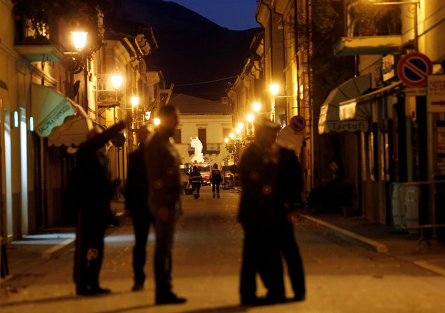 Firefighters inspect the historic centre following an earthquake in Norcia, Italy, October 30, 2016. (Photo: Reuters)