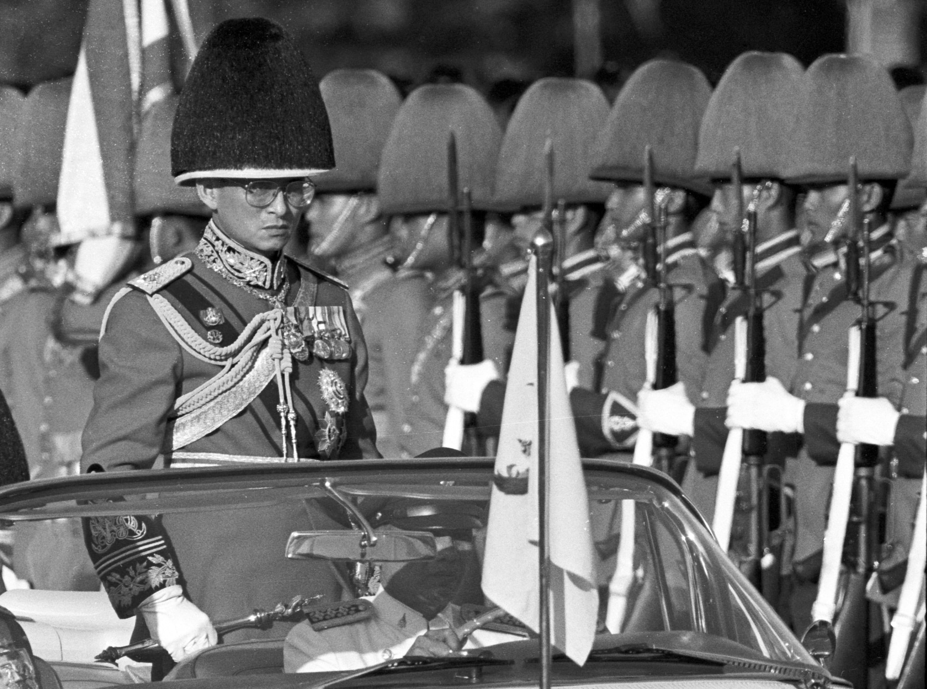 Thai King Bhumibol Adulyadej, the world's longest-reigning monarch, reviews royal guards at an annual trooping of the colours at the Royal Plaza in Bangkok,Thailand in this December 3, 1987 file photo.  (Photo: Reuters)