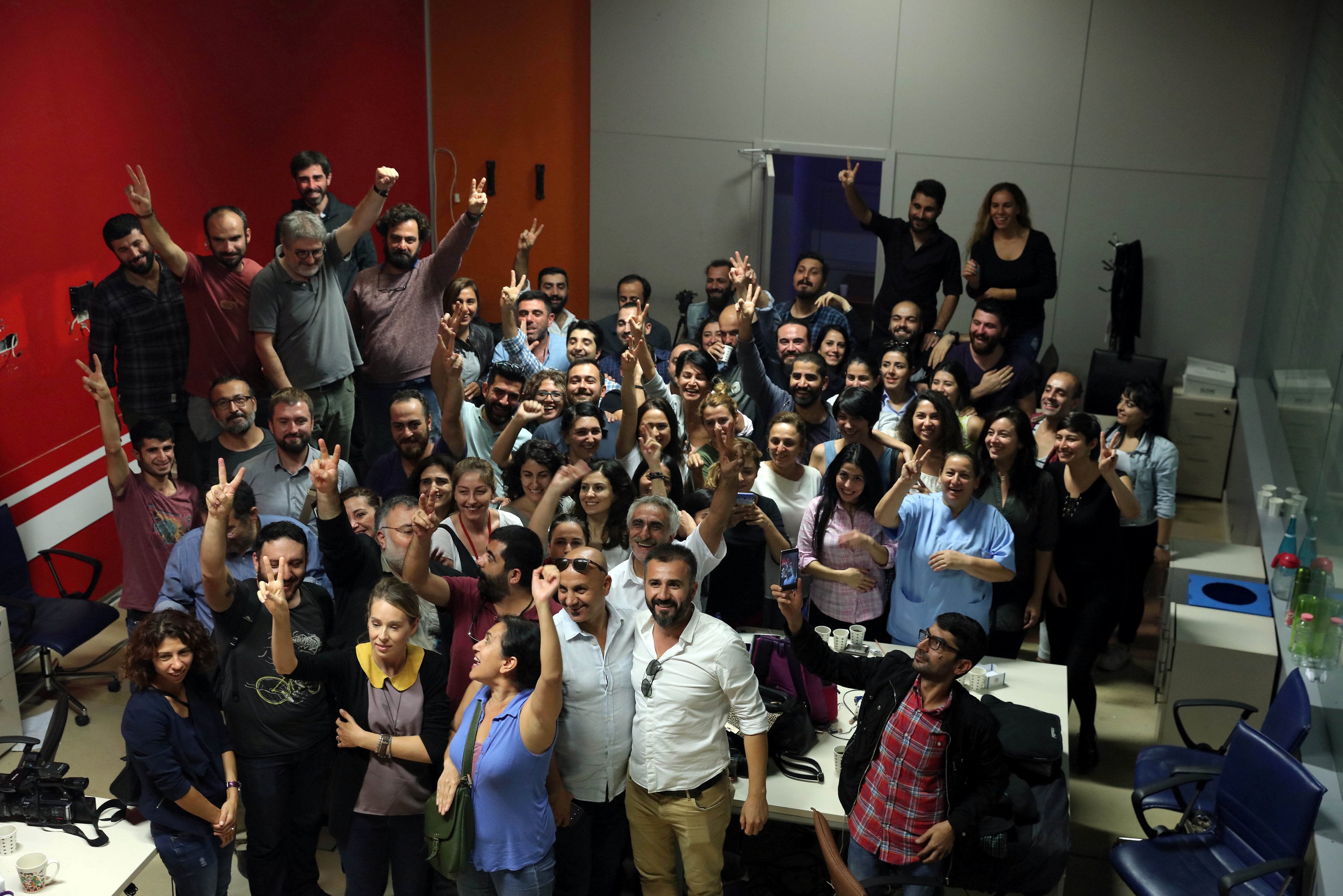 IMC TV employees gather to protest after their broadcaster's transmission cut by the authorities, based on a government decree, at IMC TV studios in Istanbul, Turkey. (Photo: Reuters)
