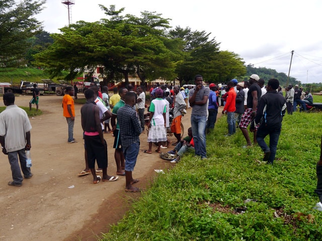 People gather near the site of a derailed Camrail train in Eseka, Cameroon, October 22, 2016.(Photo: Reuters)