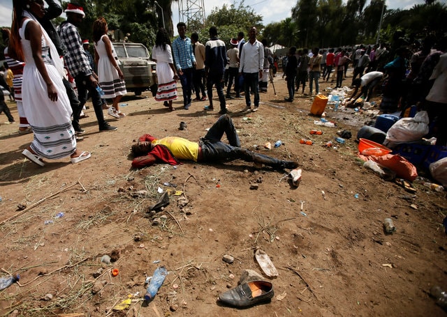 An injured protester waits for help. (Photo: Reuters)