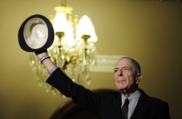 Canadian singer-songwriter Leonard Cohen gestures during a tribute in Gijon, northern Spain on October 19, 2011. (Photo: Reuters/ Eloy Alonso/ File Photo)