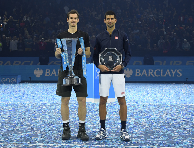 Great Britain's Andy Murray and Serbia's Novak Djokovic with their trophies after the final (Photo: Reuters/ Toby Melville Livepic)