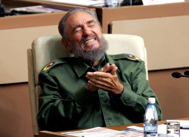 Then Cuban President Fidel Castro laughs during the year-end session of the Cuban parliament in Havana in this December 23, 2005 file photo. (Photo: Reuters)
