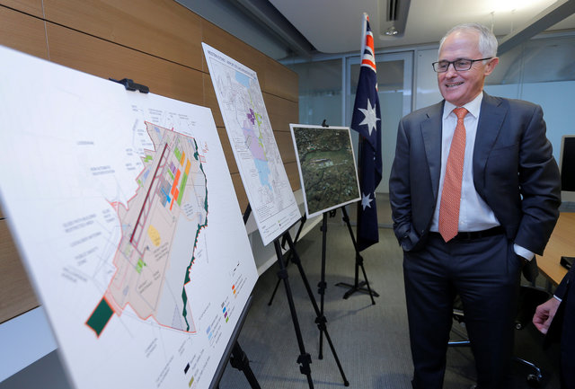 Australian Prime Minister Malcolm Turnbull observes a diagram of Sydney's proposed second international airport, to be built in Sydney's west at Badgerys Creek. (Photo: Reuters)