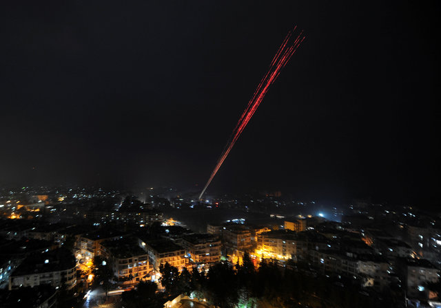 Pháo hoa được bắn lên để mừng chiến thắng Aleppo. Photo Courtesy: Reuters