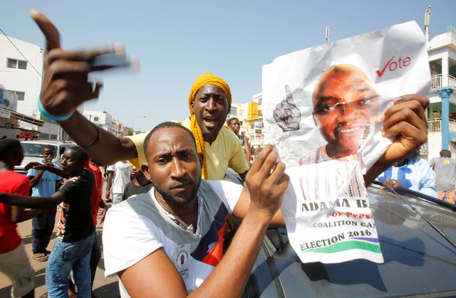 Supporters of president-elect Adama Barrow celebrate Barrow's election victory in Banjul, Gambia. (Photo: Reuters)