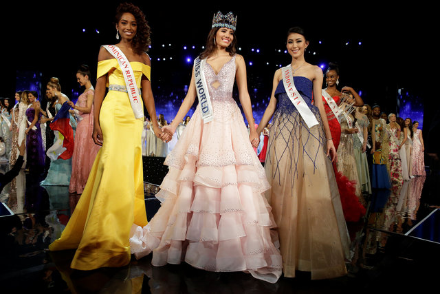 Top 3 cuộc thi năm nay gồm người đẹp Puerto Rico (giữa), Cộng hòa Dominica (trái) và người đẹp đến từ Nam Dương. Photo Courtesy: Reuters
