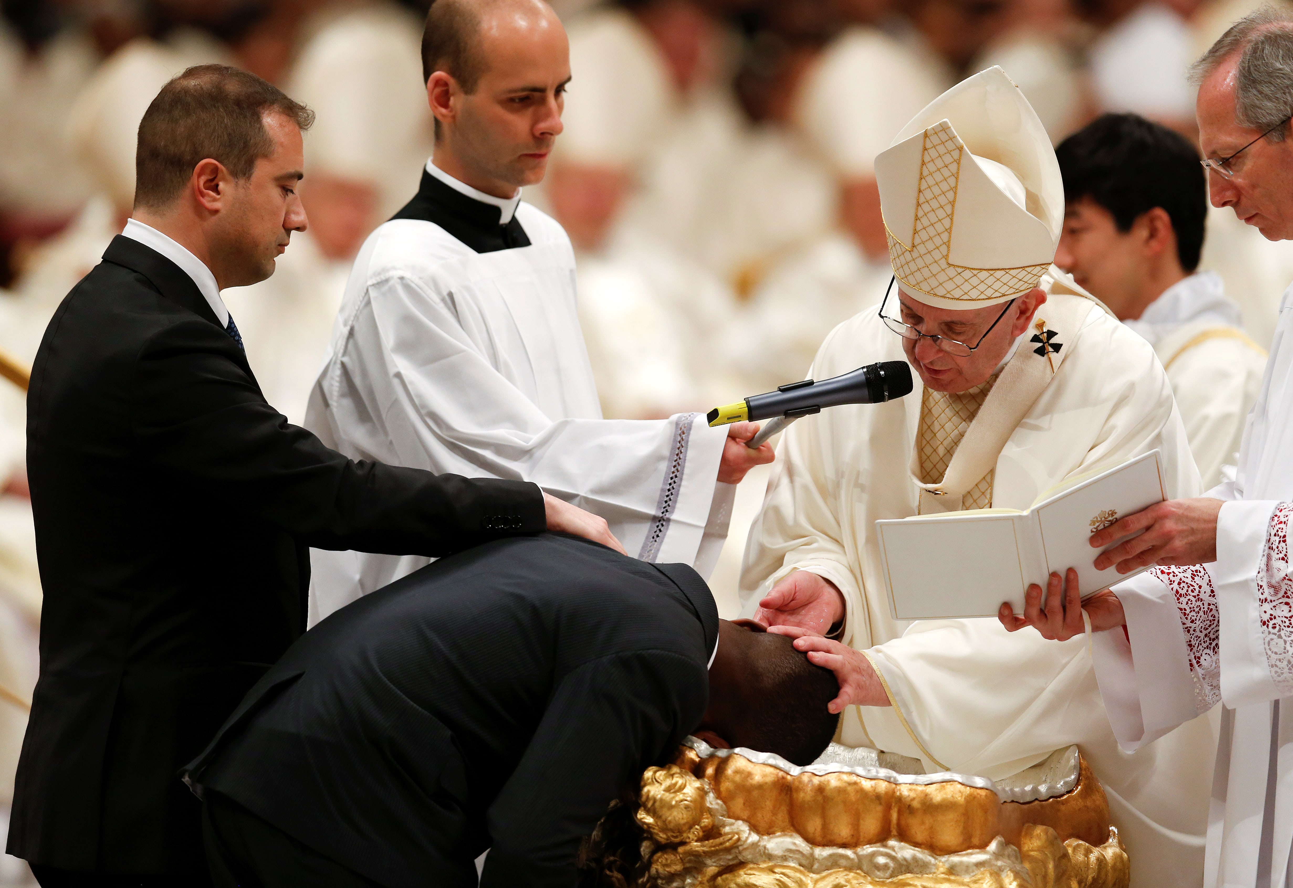 Pope baptises Italy 'migrant hero' at Easter Eve service TVTS