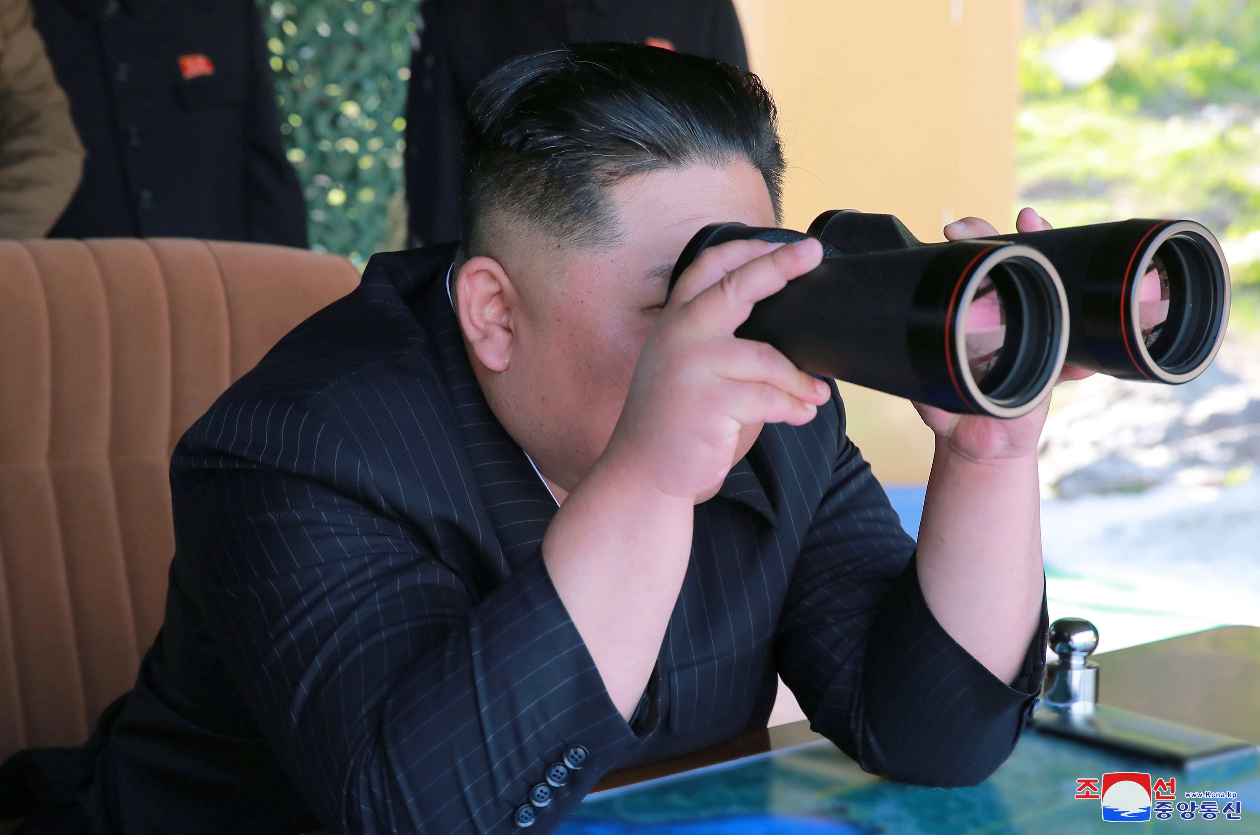 North Korea's Kim visits factories linked to missile ...